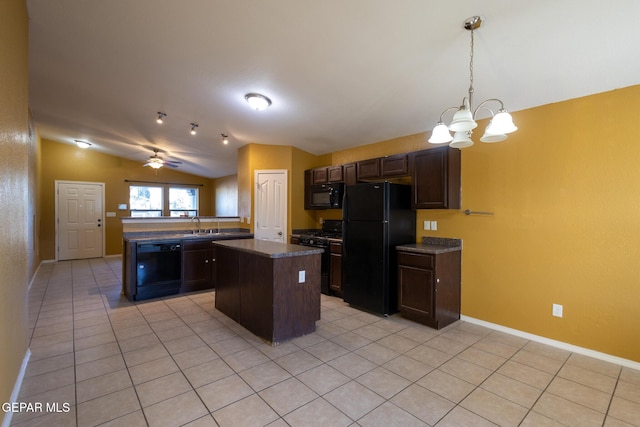 kitchen featuring light tile patterned flooring, lofted ceiling, black appliances, a kitchen island, and kitchen peninsula