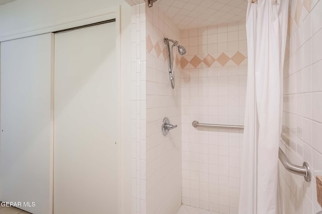 bathroom featuring walk in shower