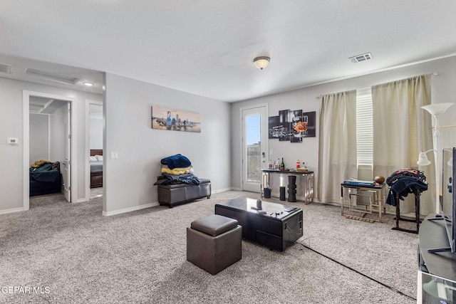 living room featuring plenty of natural light and carpet