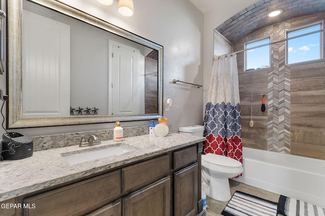 full bathroom with vanity, toilet, and shower / bathtub combination with curtain