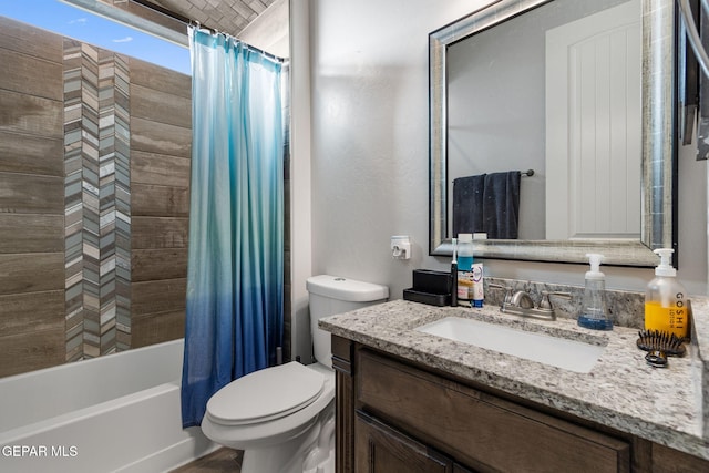 full bathroom with shower / bath combination with curtain, vanity, and toilet