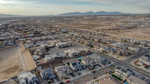 drone / aerial view featuring a mountain view