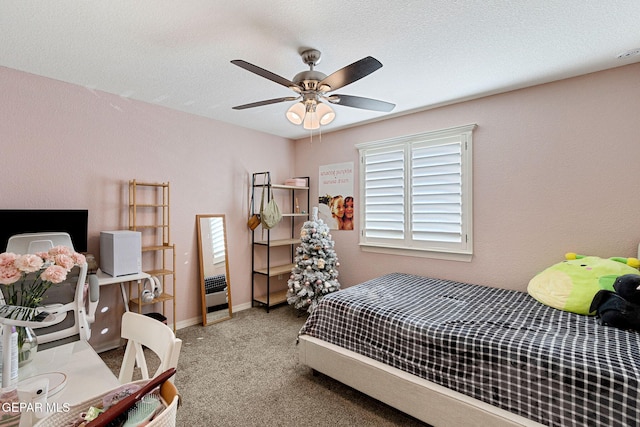 bedroom featuring carpet and ceiling fan