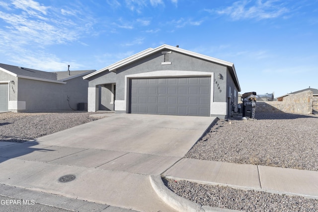 single story home with a garage