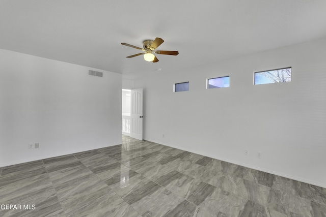 spare room featuring ceiling fan