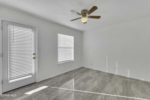 empty room with ceiling fan