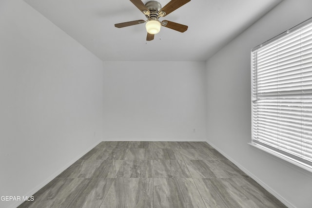 empty room featuring ceiling fan