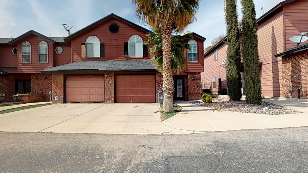 front of property with a garage