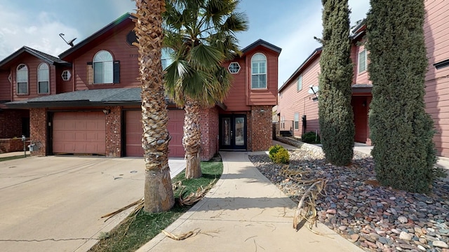 view of front of house featuring french doors and a garage