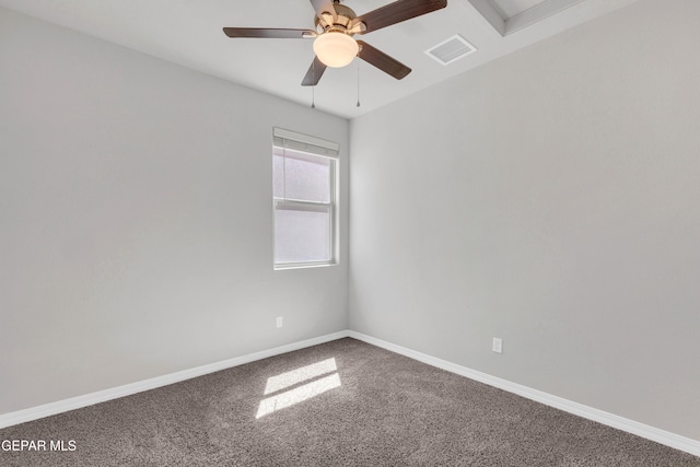 carpeted empty room with ceiling fan