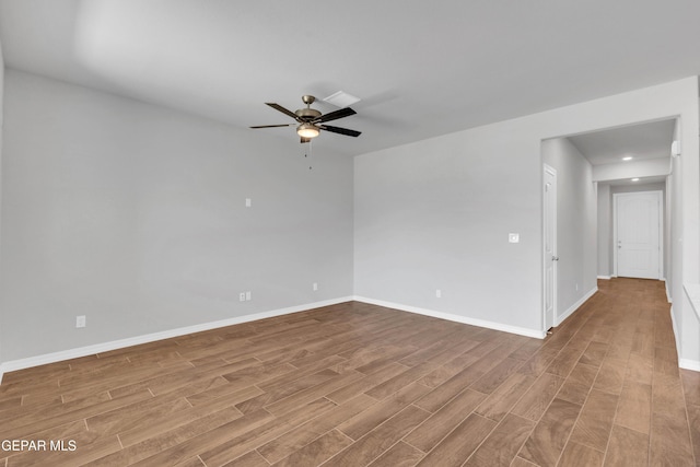 unfurnished room with ceiling fan