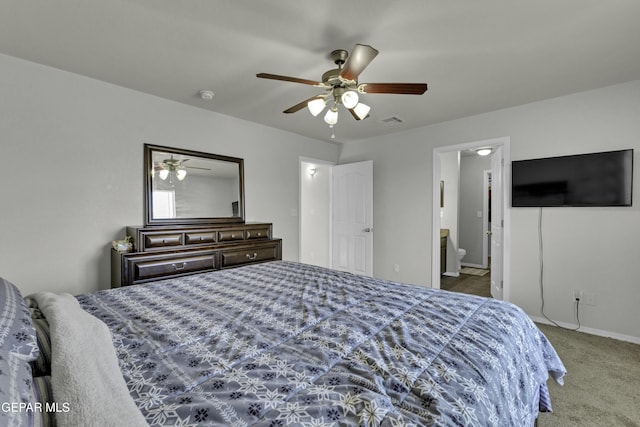 bedroom featuring carpet flooring, connected bathroom, and ceiling fan