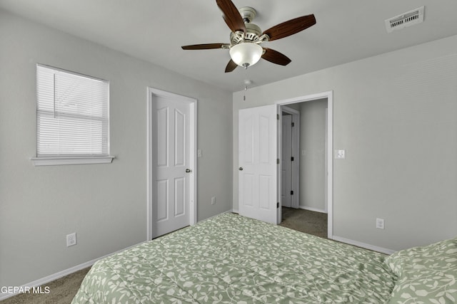 carpeted bedroom featuring ceiling fan