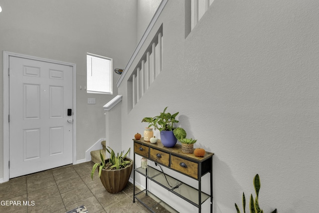 entrance foyer with tile patterned floors