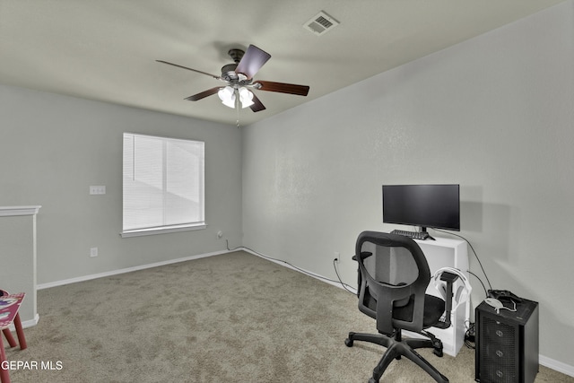 office space with ceiling fan and light colored carpet