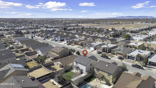 bird's eye view with a mountain view