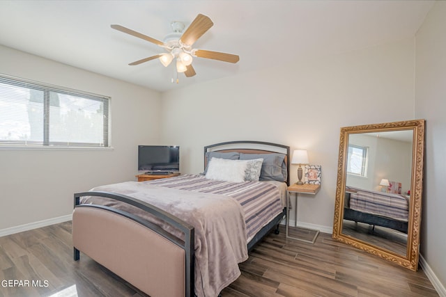 bedroom featuring ceiling fan and wood-type flooring