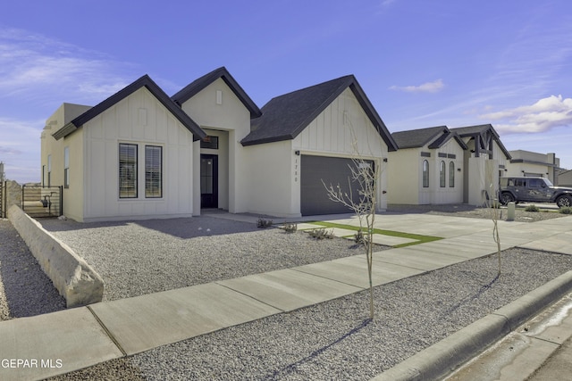 1762 Green Valley St, El Paso, TX 79928 - modern farmhouse style home with board and batten siding, concrete driveway, and a garage