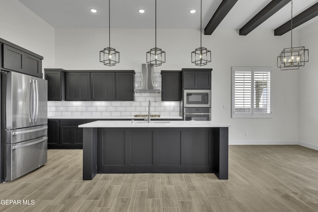 1762 Green Valley St, El Paso, TX 79928 - kitchen with stainless steel appliances, extractor fan, light countertops, backsplash, and beamed ceiling