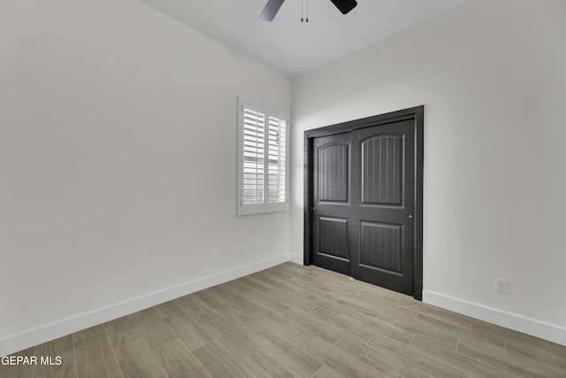 1762 Green Valley St, El Paso, TX 79928 - unfurnished bedroom featuring baseboards, light wood finished floors, and a ceiling fan