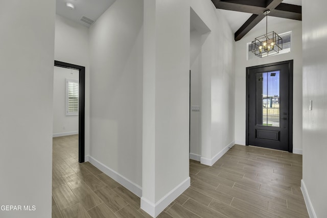 1762 Green Valley St, El Paso, TX 79928 - entrance foyer featuring high vaulted ceiling, healthy amount of natural light, a chandelier, baseboards, and beam ceiling
