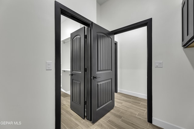 1762 Green Valley St, El Paso, TX 79928 - hall featuring baseboards and wood finish floors