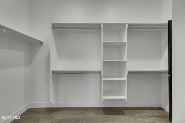 1762 Green Valley St, El Paso, TX 79928 - walk in closet with wood tiled floors