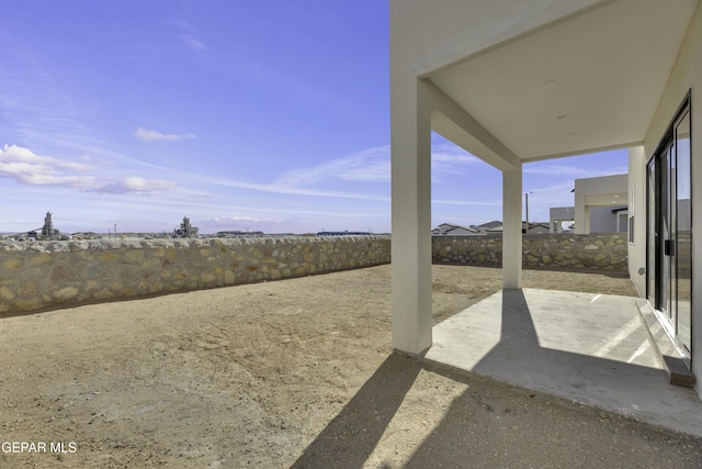 1762 Green Valley St, El Paso, TX 79928 - fenced backyard with a patio area