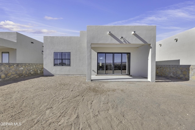 1762 Green Valley St, El Paso, TX 79928 - back of house with stucco siding