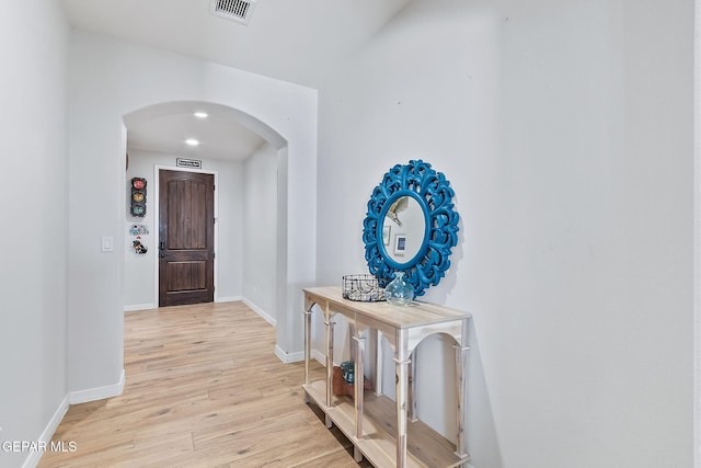 hallway featuring light hardwood / wood-style floors