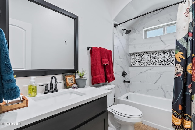 full bathroom featuring vanity, toilet, and shower / tub combo with curtain