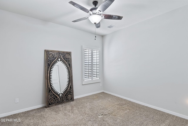 carpeted empty room with ceiling fan