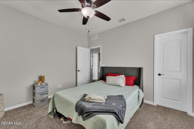 bedroom with ceiling fan and carpet