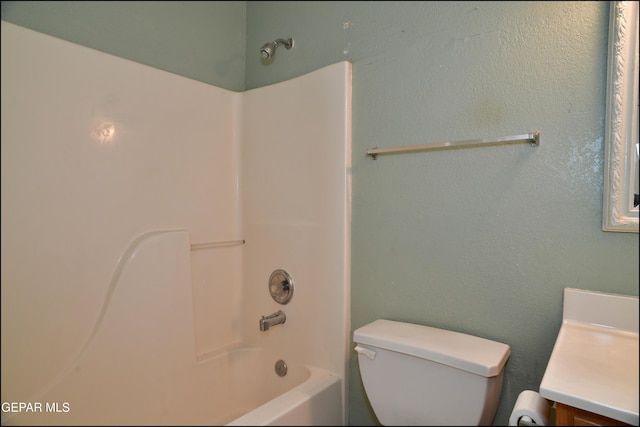 12560 Angie Bombach Ave, El Paso, TX 79928 - full bathroom featuring toilet, vanity, and tub / shower combination