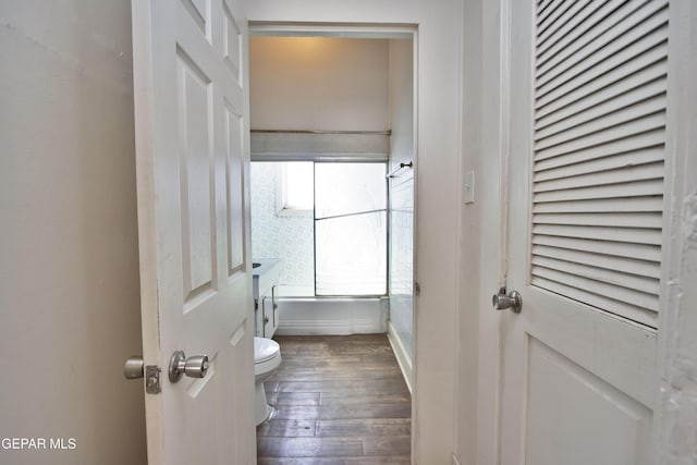 bathroom featuring toilet and hardwood / wood-style flooring