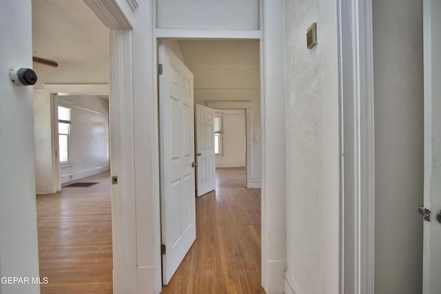 hallway featuring light hardwood / wood-style flooring