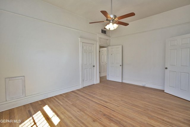 unfurnished room featuring ceiling fan and light hardwood / wood-style flooring