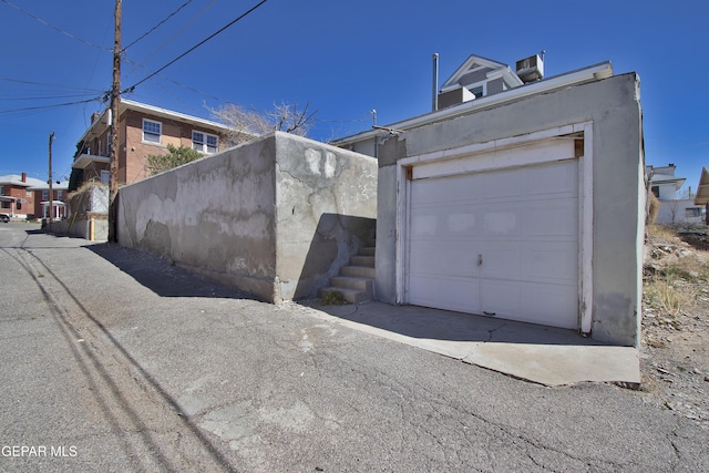 exterior space with a garage