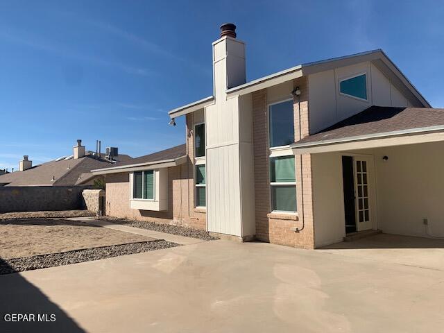 back of property featuring a patio and central AC unit