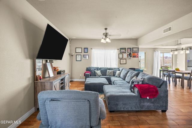 living room featuring ceiling fan