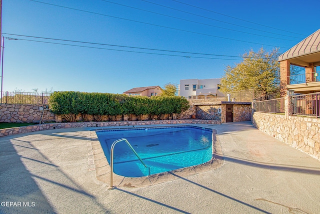 view of pool with a patio