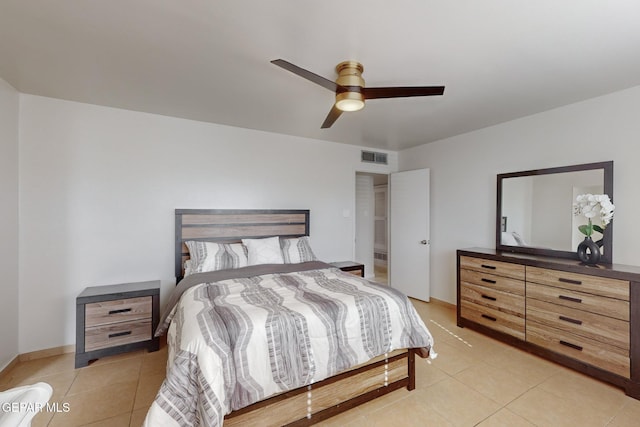 bedroom featuring ceiling fan and light tile patterned floors