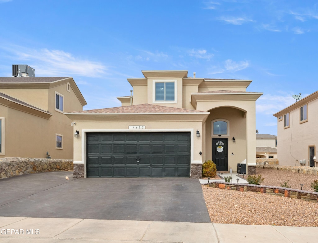 view of front of property with a garage