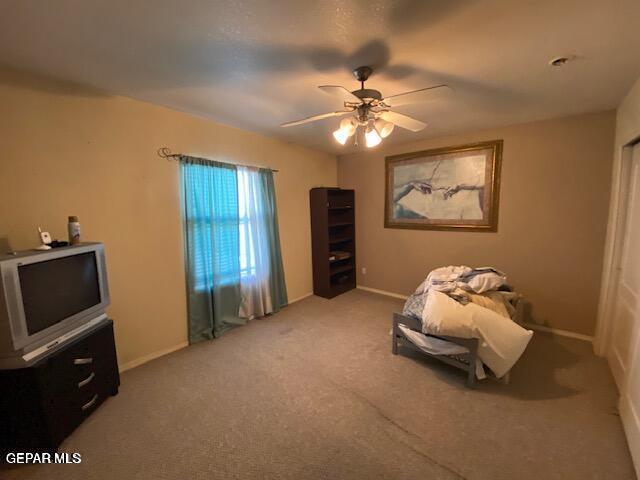 bedroom with carpet flooring and ceiling fan