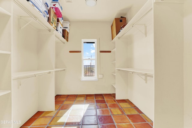 walk in closet featuring tile patterned floors