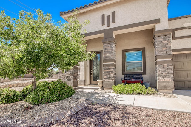 property entrance featuring a garage