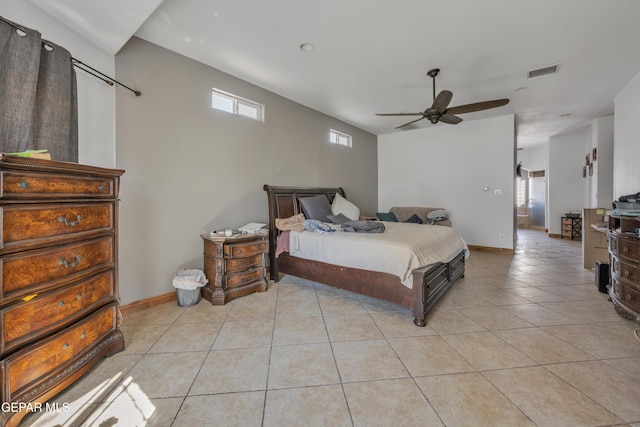 bedroom with light tile patterned floors and ceiling fan