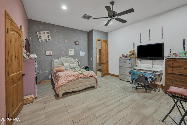 bedroom featuring ceiling fan and light hardwood / wood-style floors