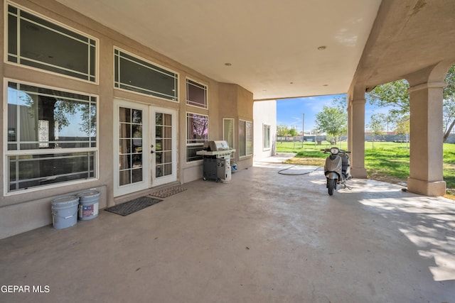 view of patio / terrace featuring a grill and french doors