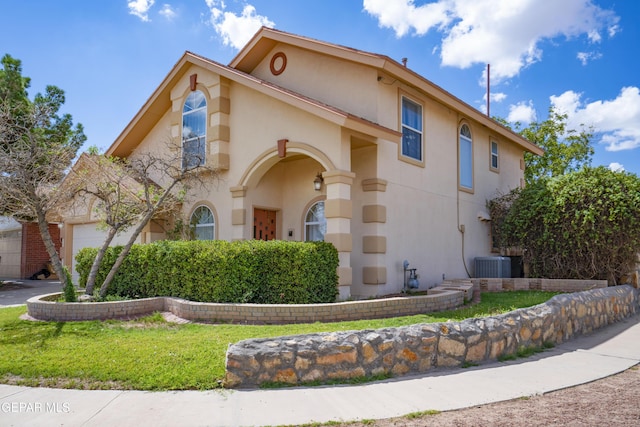 view of front of house featuring a front lawn and cooling unit